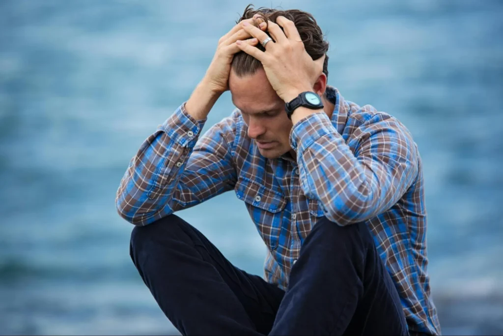 Image of a stressed business owner worrying about payment processing.