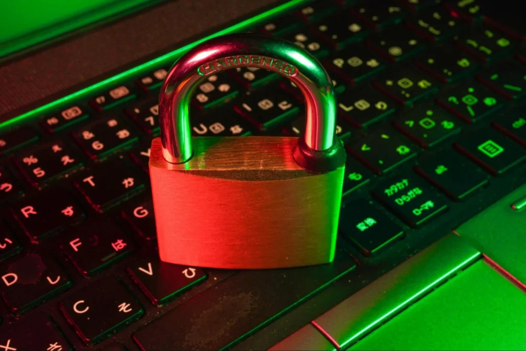 A laptop on a keyboard highlighting the importance of security in payment processing.
