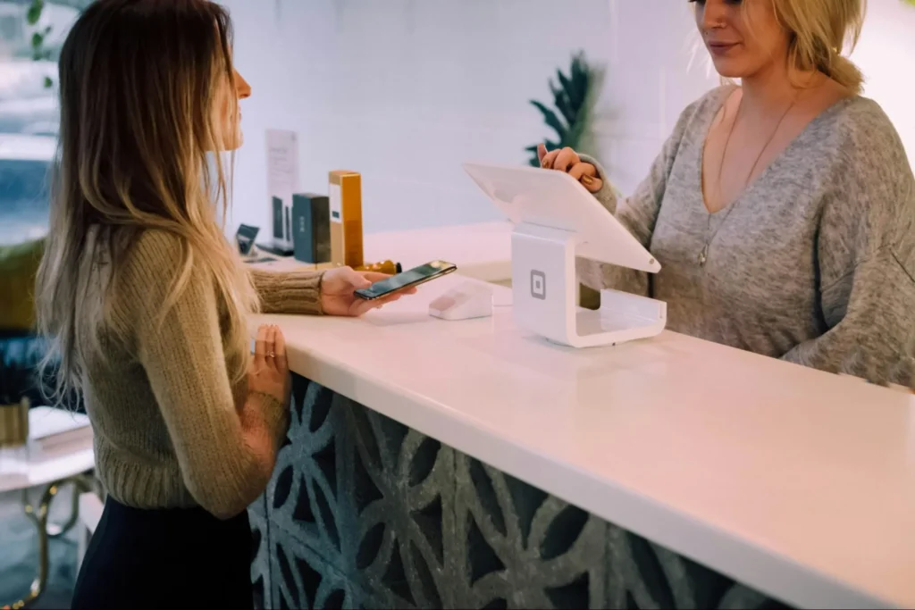 A customer purchasing an item on a convenient buy now pay later arrangement for customers and businesses.