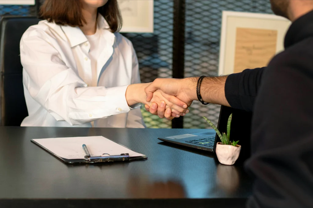 Business partners working together to increase the chances of being accepted for a bad credit merchant account.
