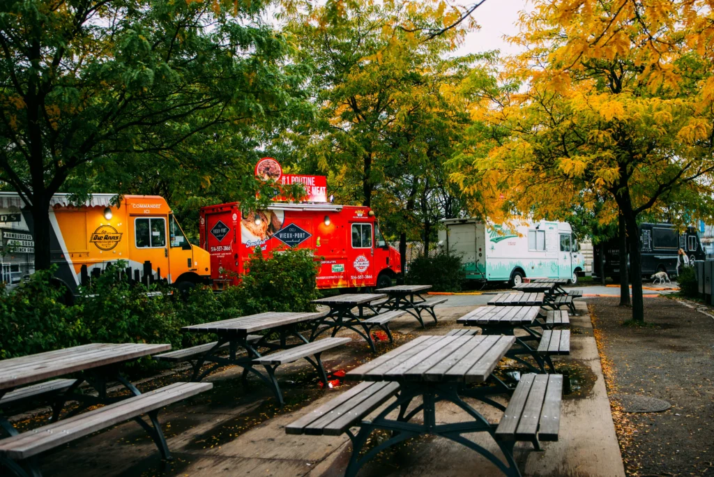 A row of food trucks, all requiring specialized point of sale systems.