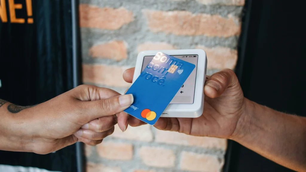 A customer making a contactless payment, routed through a payment gateway.