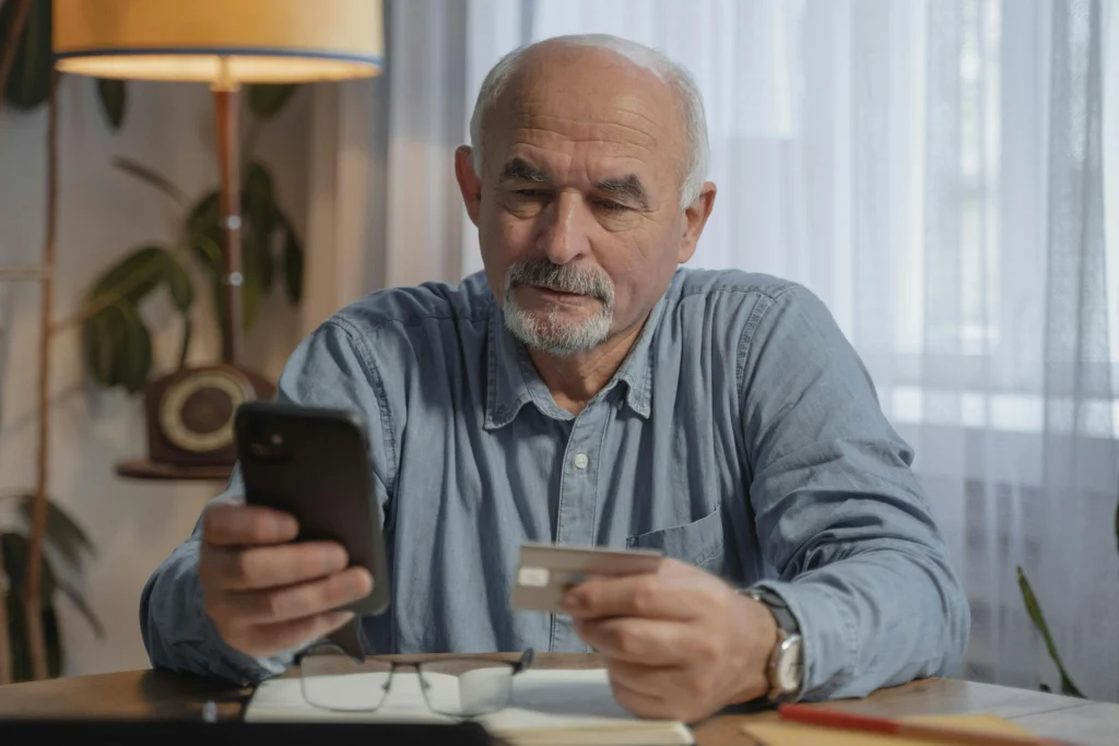 A customer making a credit card payment online, including payment processing fees.