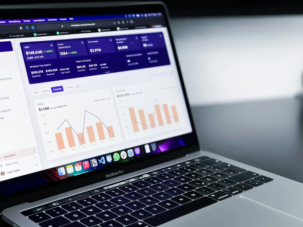 A computer showing analytics from payment processing fees.