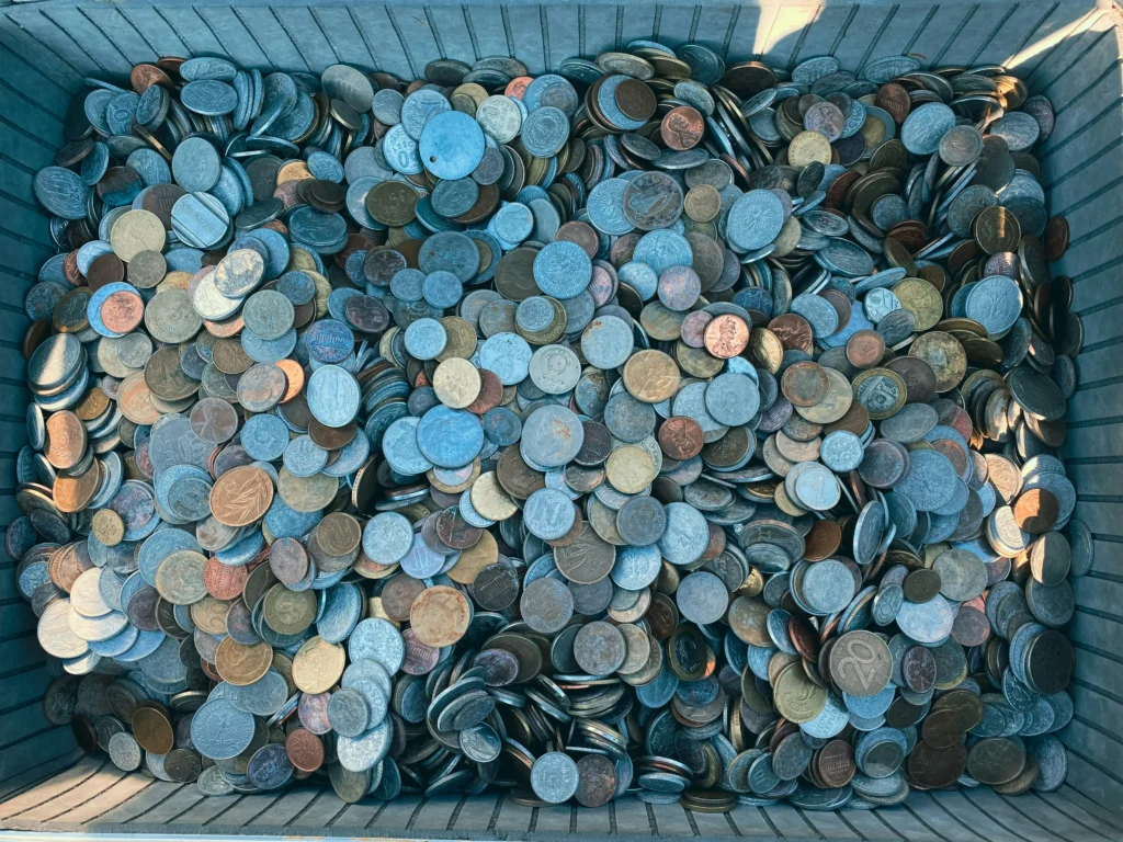 A box full of coins, representing micropayments that add up over time.