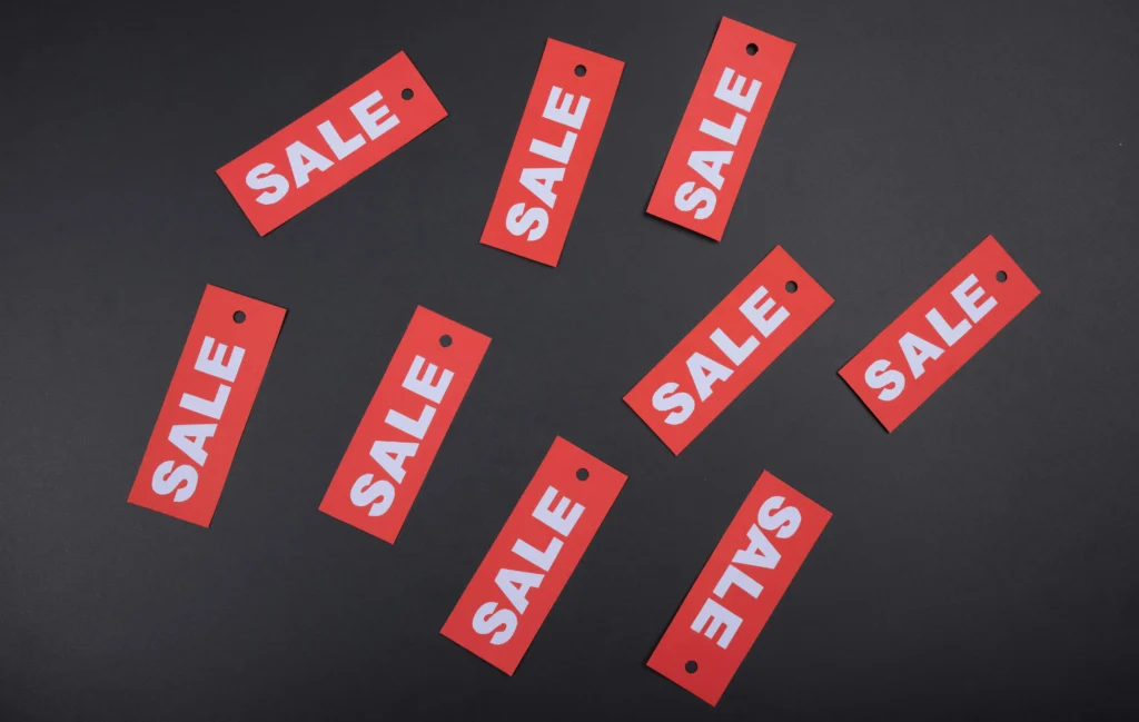 Black Friday sale stickers, when interchange rates often vary.