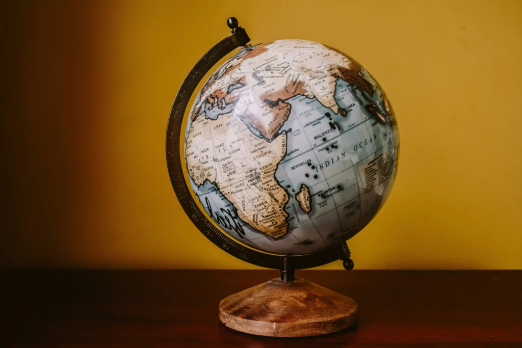 A globe representing worldwide trade and payment processing regulations from area to area.
