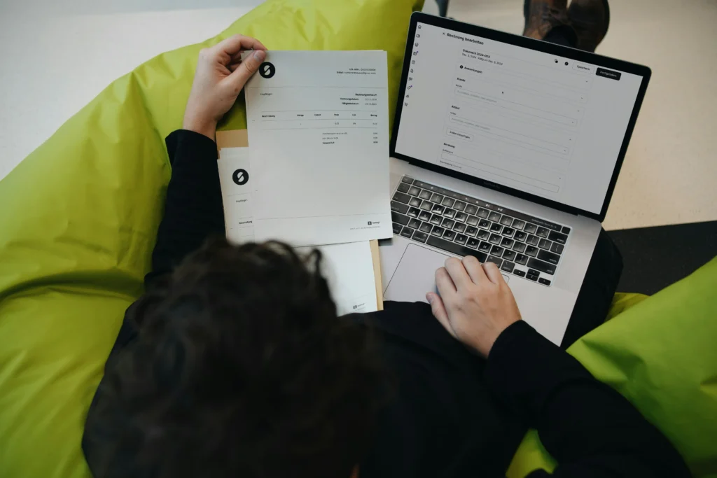 A freelancer creating an invoice for recent work and waiting for payment.