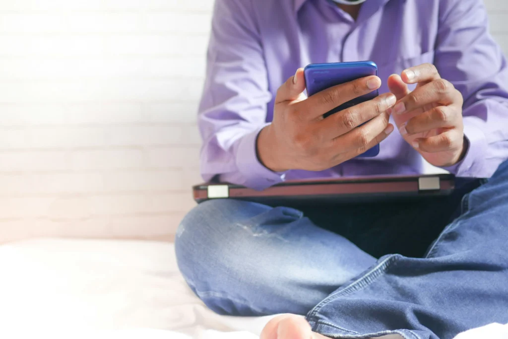 A customer making an online payment on their phone, processed through a company’s VPOS.